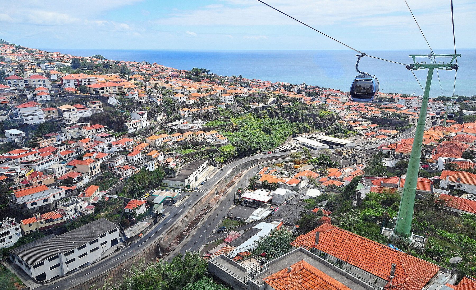 Funchal waterfront and terracotta rooftops at golden hour