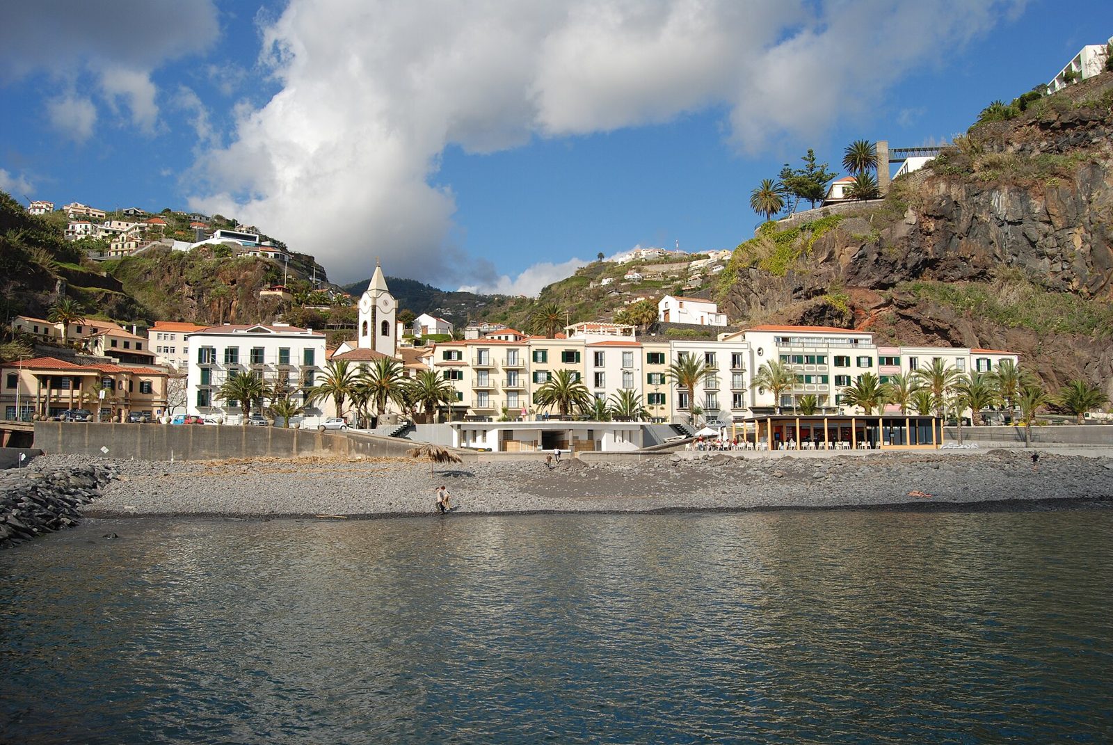 Pebble beach and cliffs at Ponta do Sol on Madeira's south coast