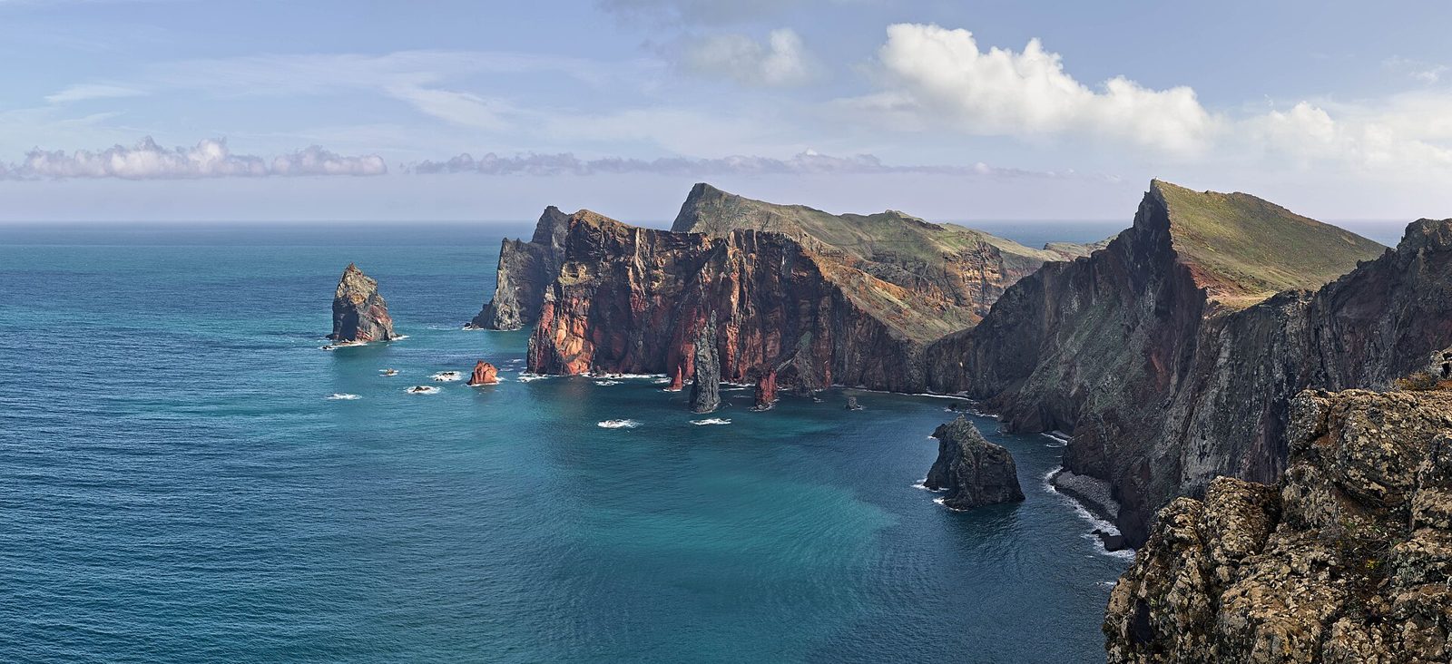 Red and ochre volcanic cliffs of the Ponta de São Lourenço peninsula